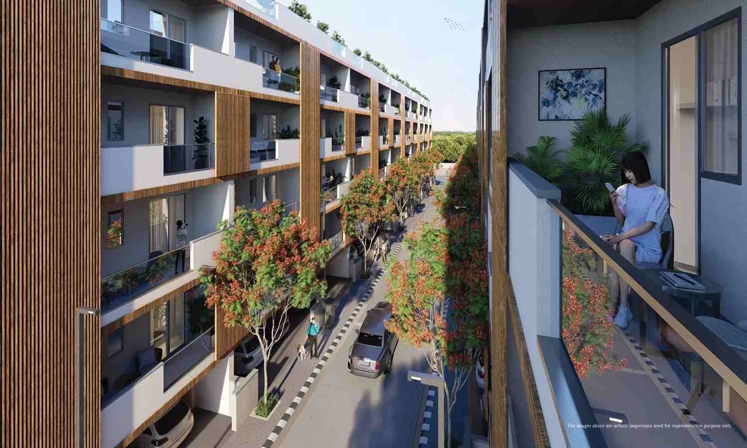 Modern low-rise apartments at M2K Olive Greens with balconies and landscaped street view