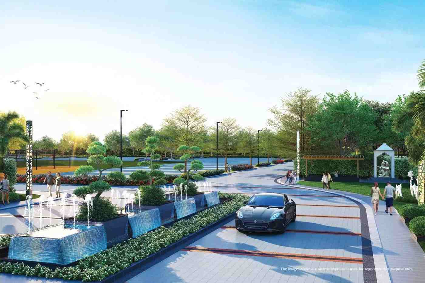 Landscaped entrance boulevard with fountains and greenery