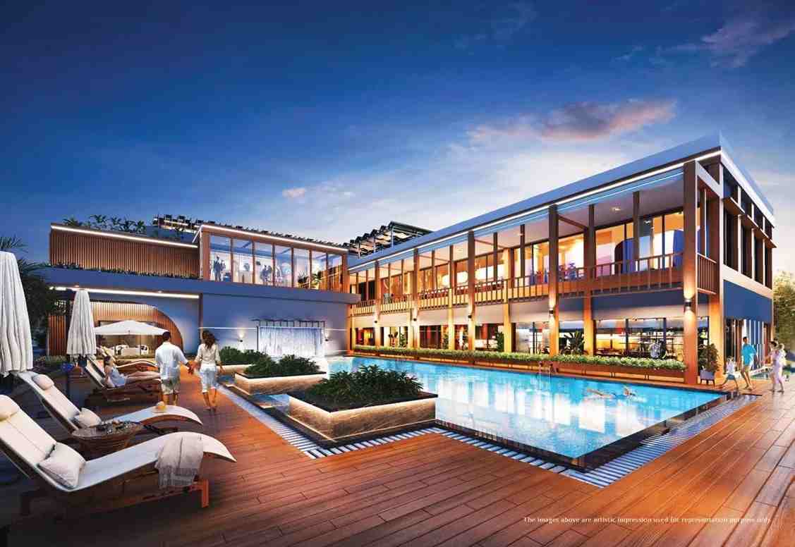 Club 104 luxury clubhouse with swimming pool, deck seating and modern lifestyle amenities
